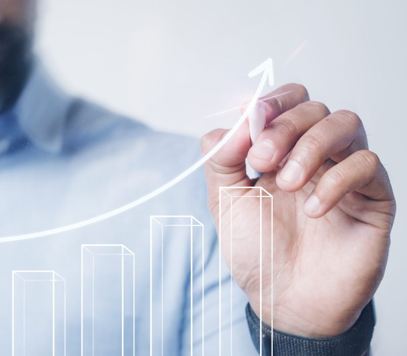 Man giving a bar graph presentation using a high technology digital pen